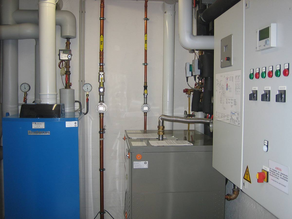 Geothermal heat pump system for an apartment building: 165% efficiency